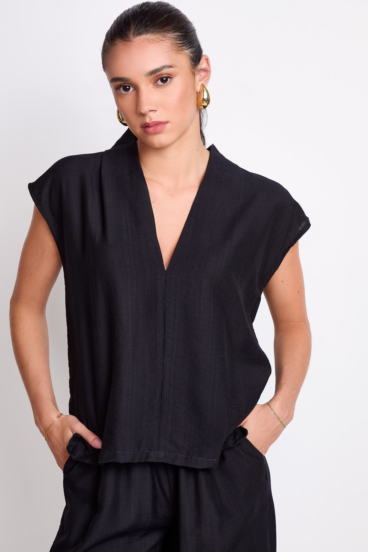 Blusa manga corrida escote en V